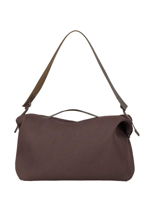 PLEATS TRAVEL BAG sold by Issey Miyake