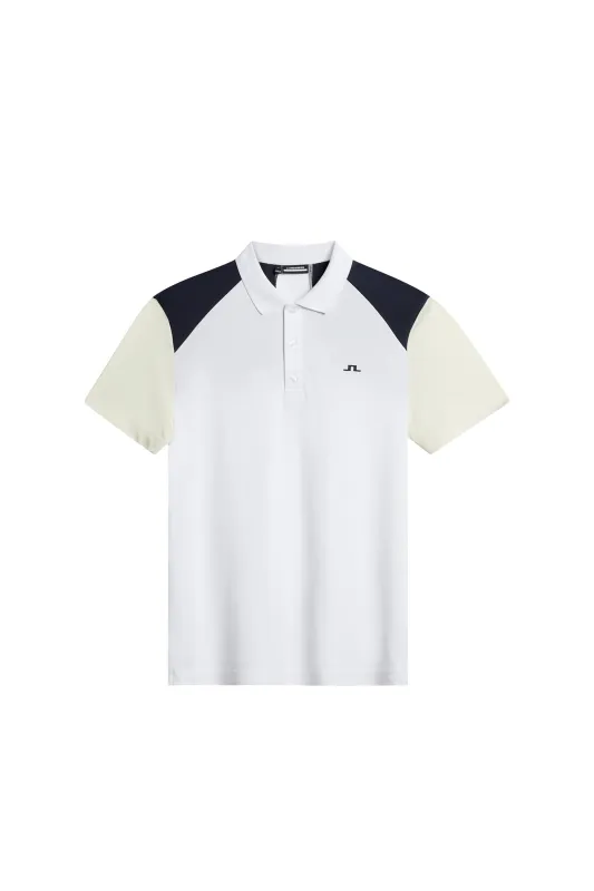 Block Polo / White sold by J. Lindeberg