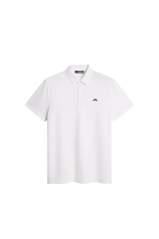 Peat Polo / White sold by J. Lindeberg