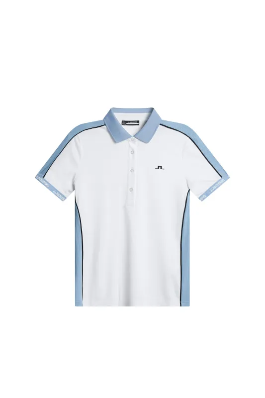 Demi Polo / White sold by J. Lindeberg