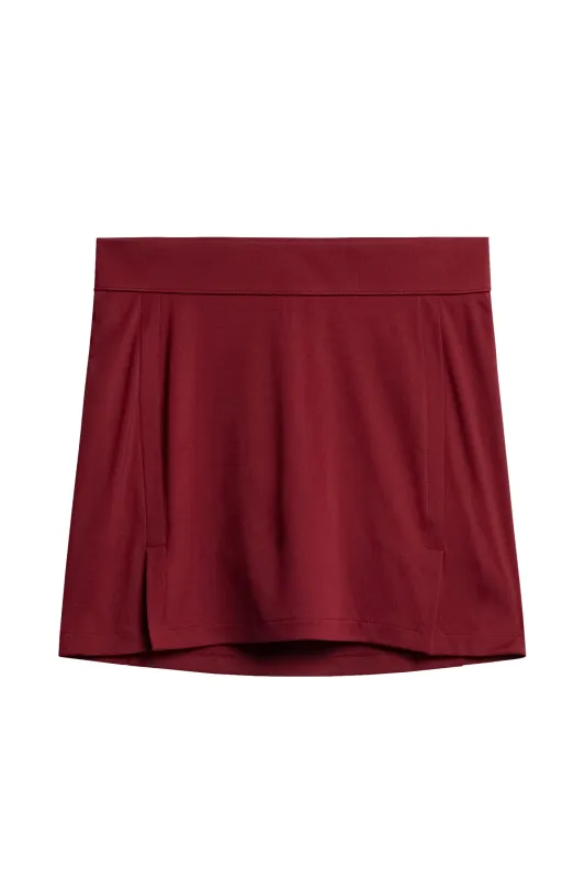 Amelie Mid Skirt / Cabernet sold by J. Lindeberg