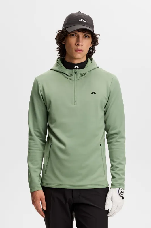 Aerial Quarter Zip Hood / Hedge Green sold by J. Lindeberg