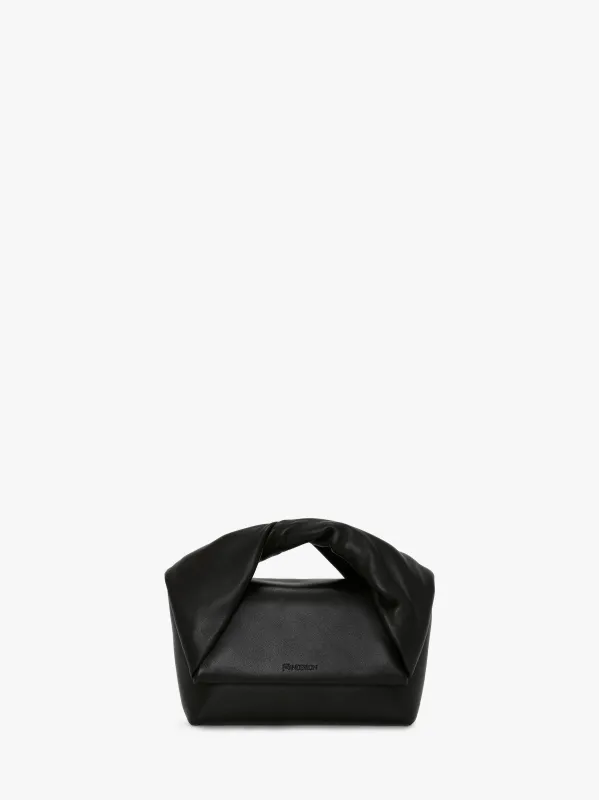 MEDIUM TWISTER - LEATHER TOP HANDLE BAG sold by J.W. Anderson