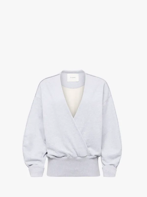 ROUNDED WRAP-FRONT SWEATSHIRT sold by J.W. Anderson