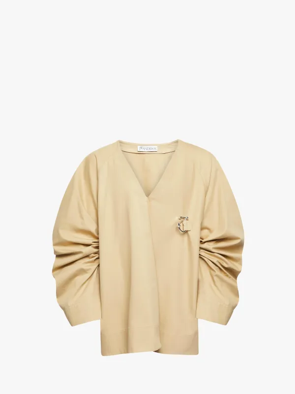 OVERSIZED V-NECK GATHERED SLEEVE TOP sold by J.W. Anderson