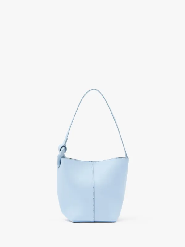 SMALL JWA CORNER BUCKET - LEATHER BUCKET BAG sold by J.W. Anderson