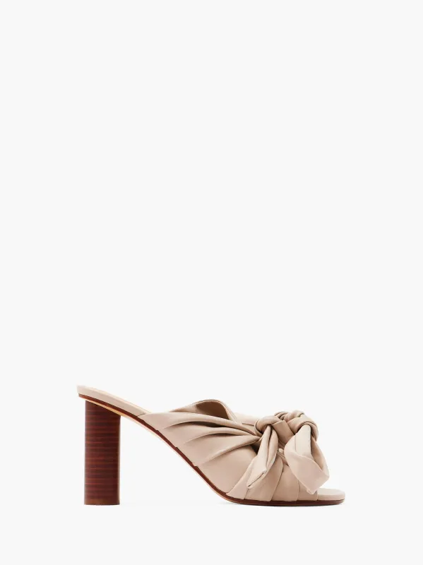 BOW HEELED MULES sold by J.W. Anderson