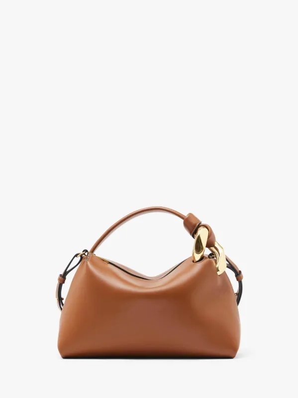 JWA CORNER BAG - LEATHER TOP HANDLE BAG sold by J.W. Anderson