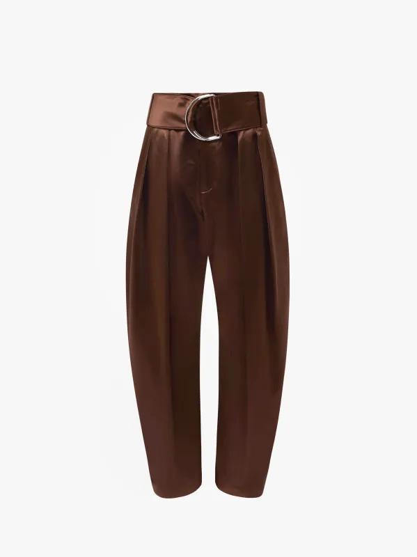 PLEATED D-RING TROUSERS sold by J.W. Anderson