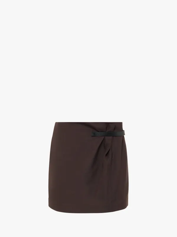 LEATHER TAB MINI SKIRT sold by J.W. Anderson