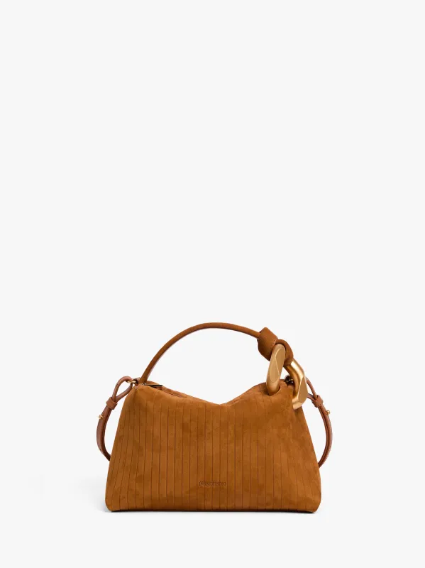 SMALL JWA CORNER BAG - SUEDE CROSSBODY BAG sold by J.W. Anderson