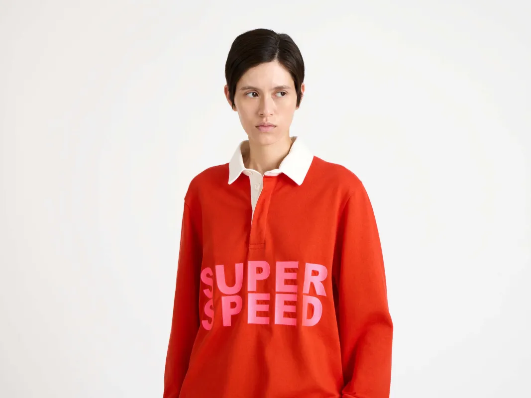 WOMENS 'SUPER SPEED' RUGBY POLO TOP IN BRIGHT RED sold by J.W. Anderson