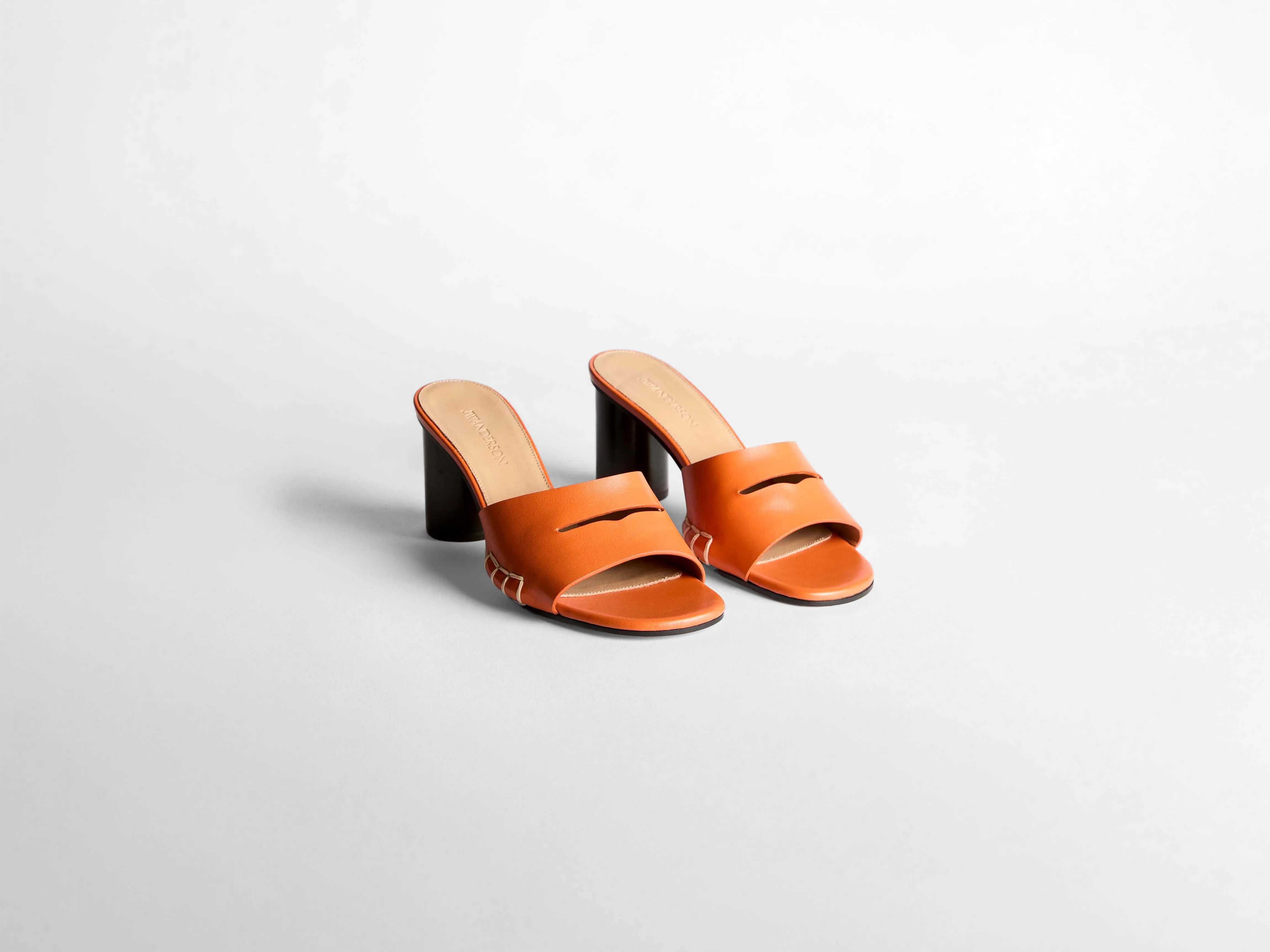 WOMENS LOAFER MULE HEELED SANDAL IN ORANGE sold by J.W. Anderson