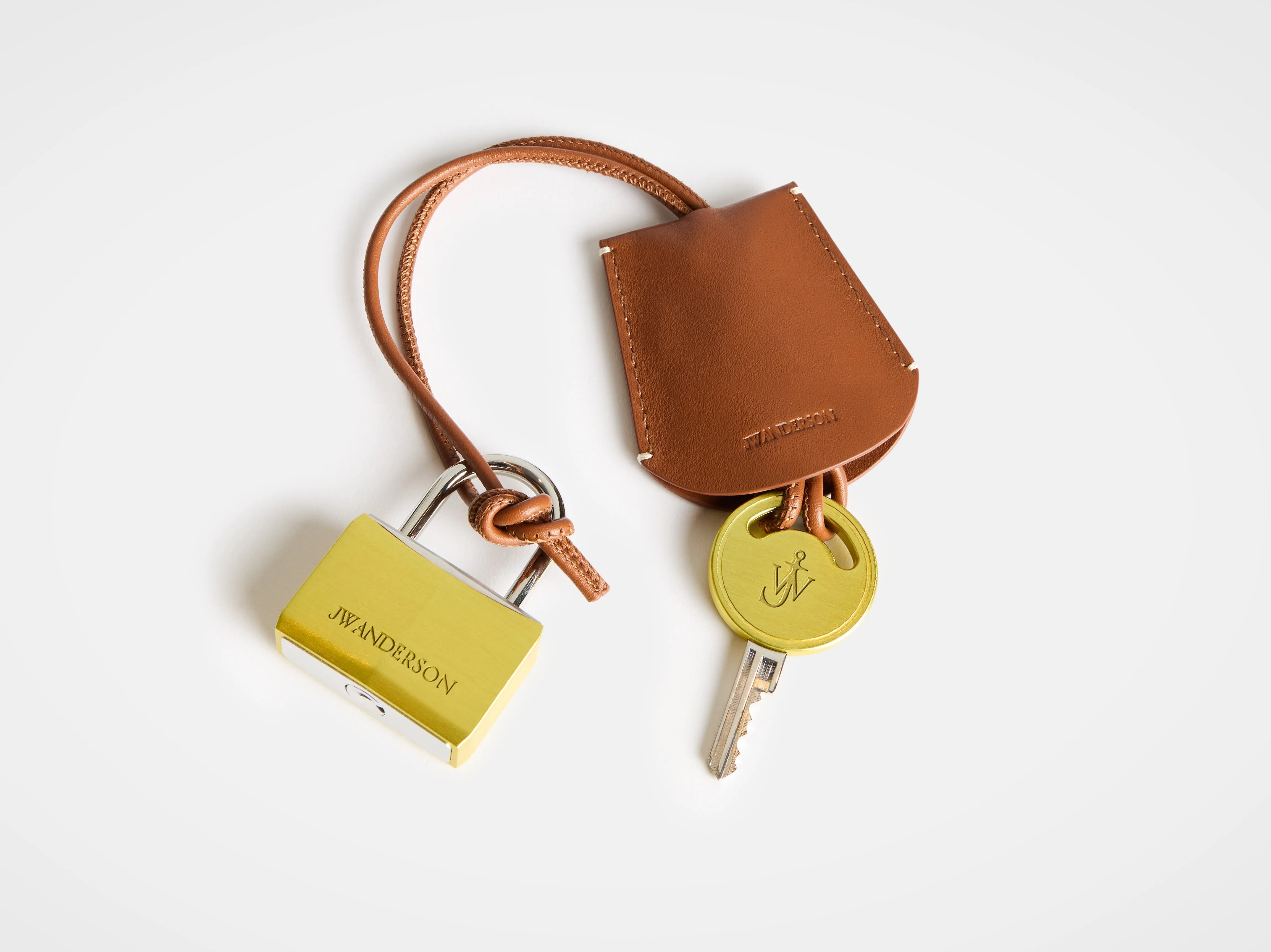 PADLOCK CHARM IN YELLOW sold by J.W. Anderson