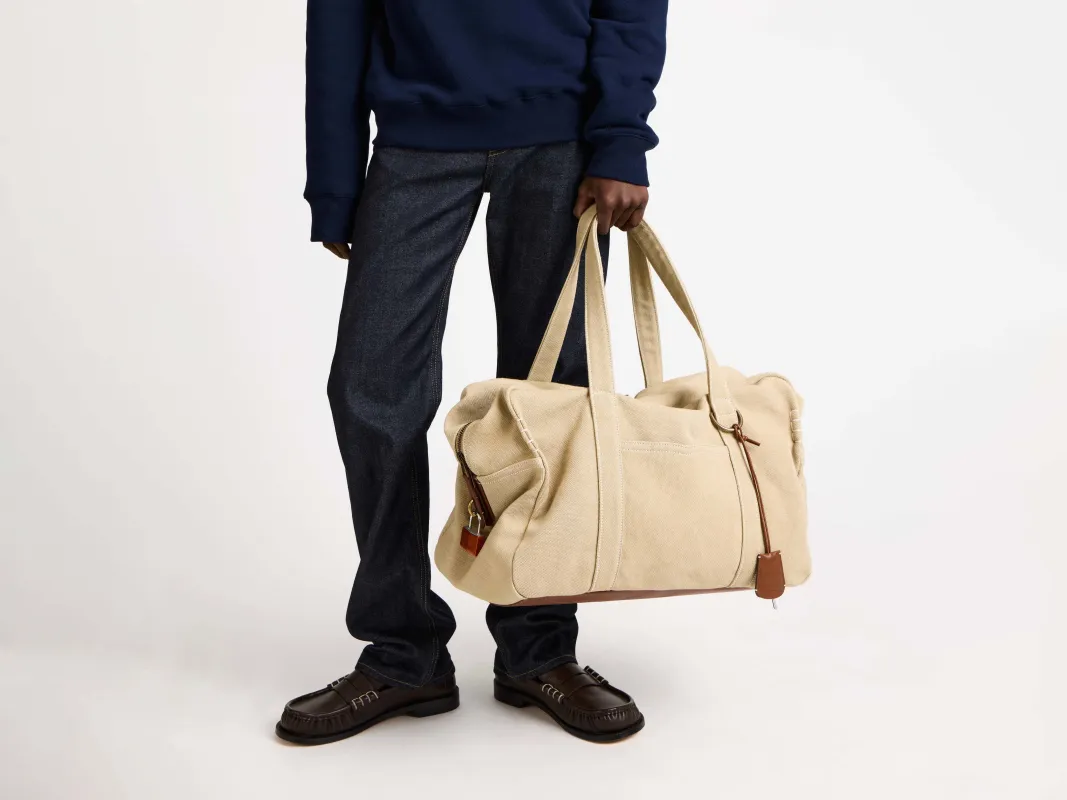 WEEKENDER CANVAS TOTE BAG IN STONE sold by J.W. Anderson