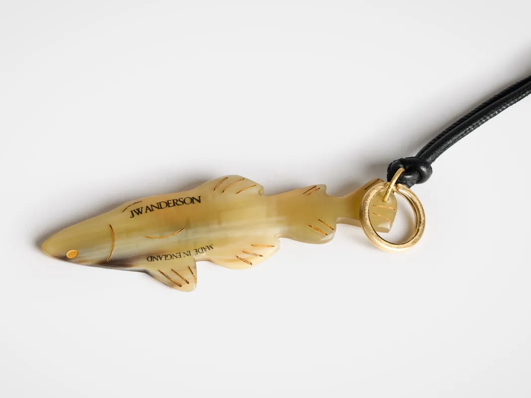 HORN-CRAFTED FISH CHARM sold by J.W. Anderson