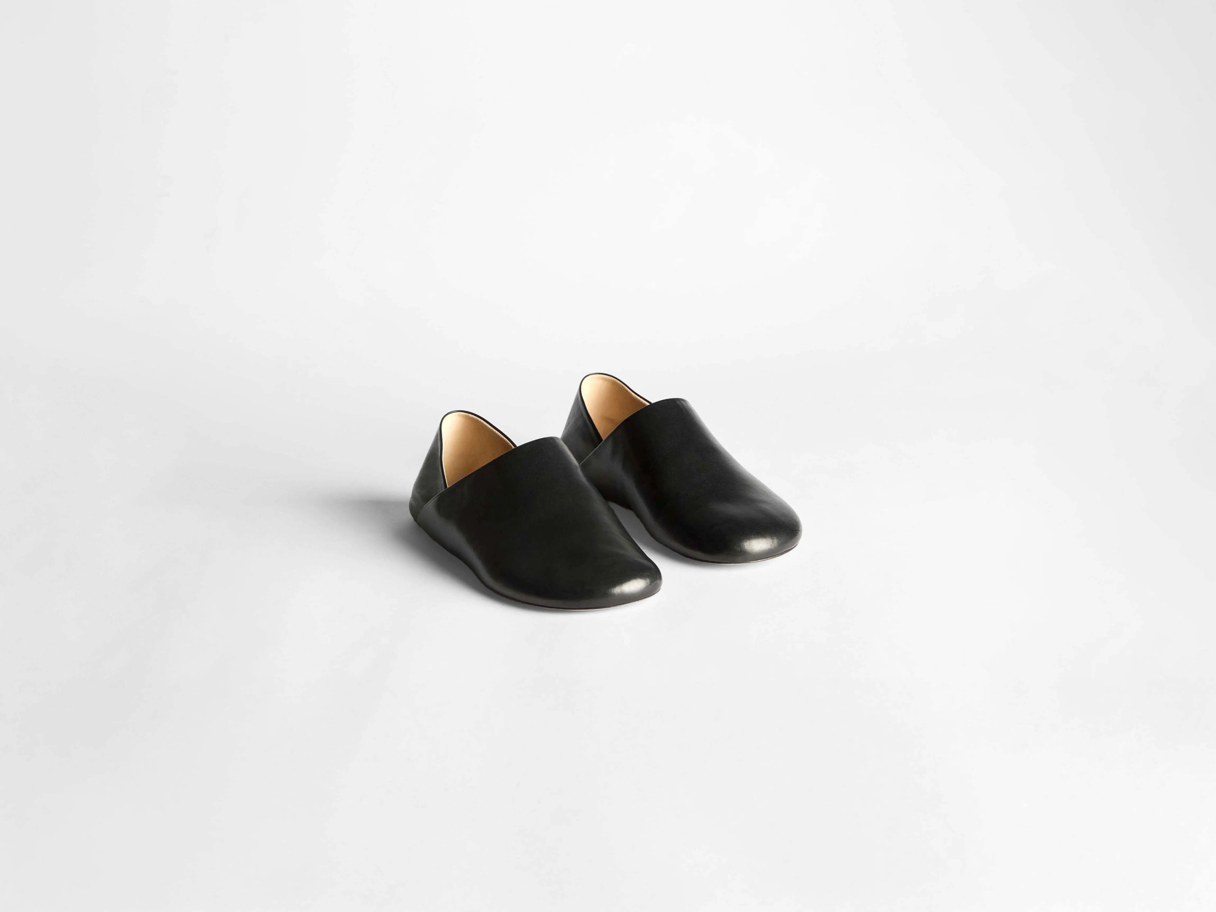 WOMENS SLIPPER MULES IN BLACK sold by J.W. Anderson