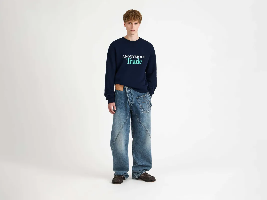 MENS TWISTED WORKWEAR DENIM JEANS IN MID BLUE made by J.W. Anderson