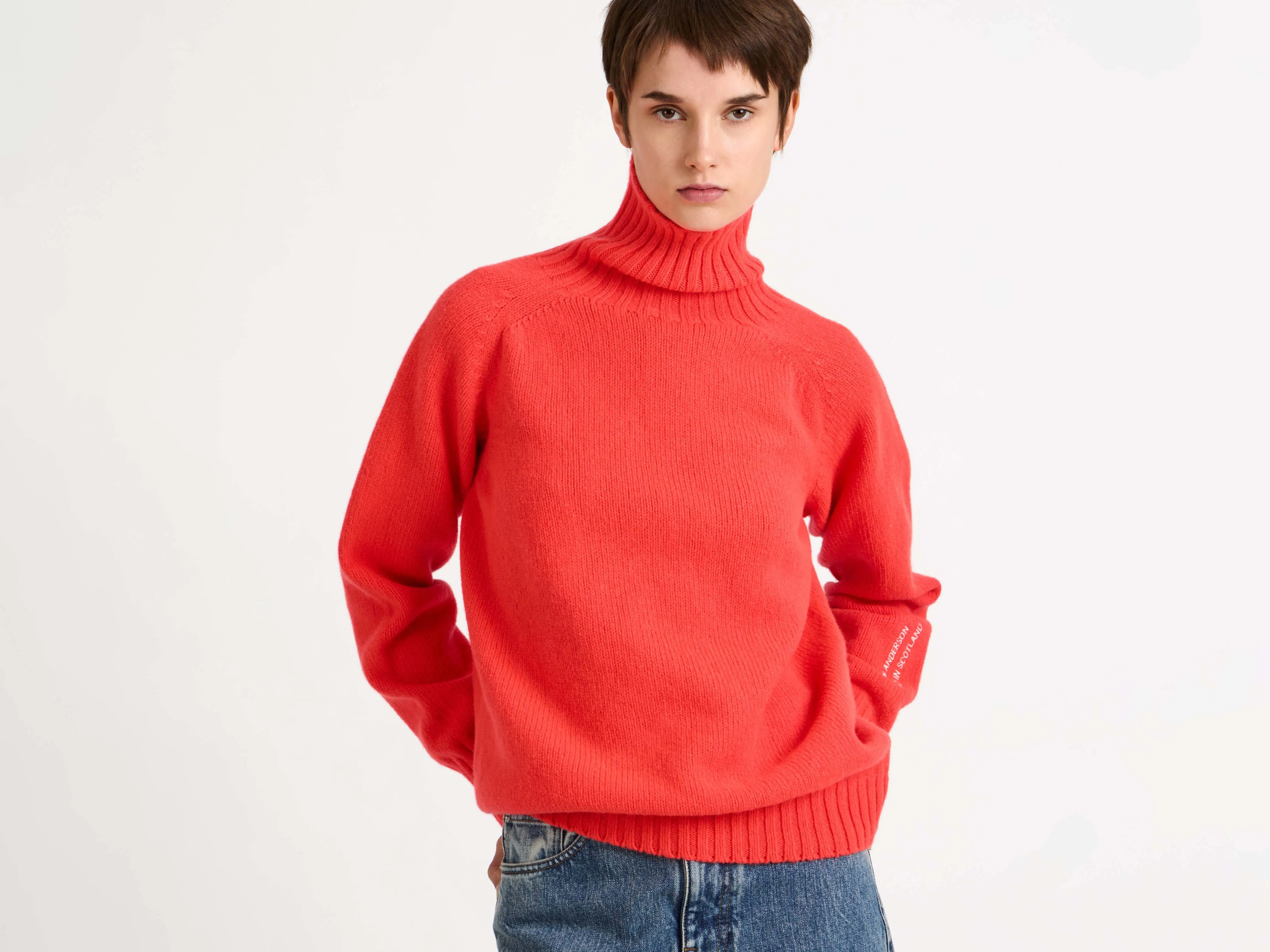 WOMENS TURTLENECK JUMPER IN NEON ORANGE sold by J.W. Anderson