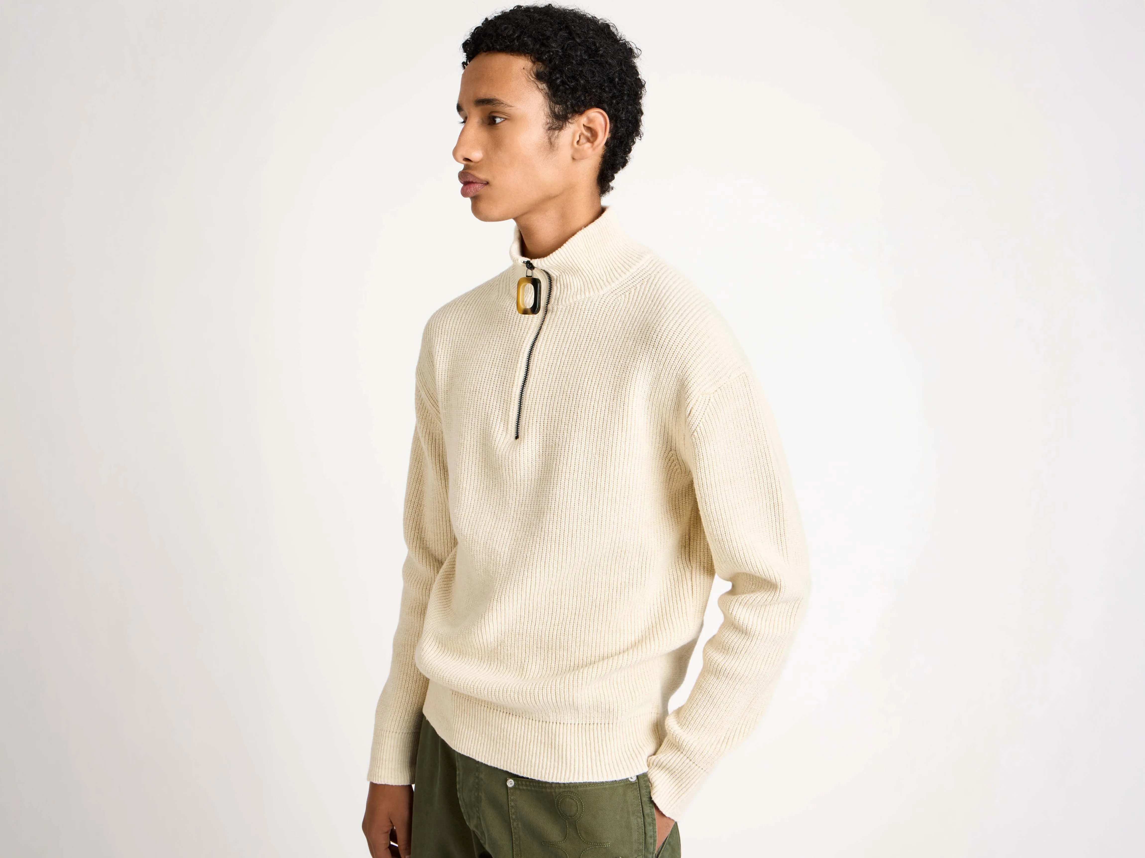 MENS HALF ZIP JUMPER IN IVORY sold by J.W. Anderson
