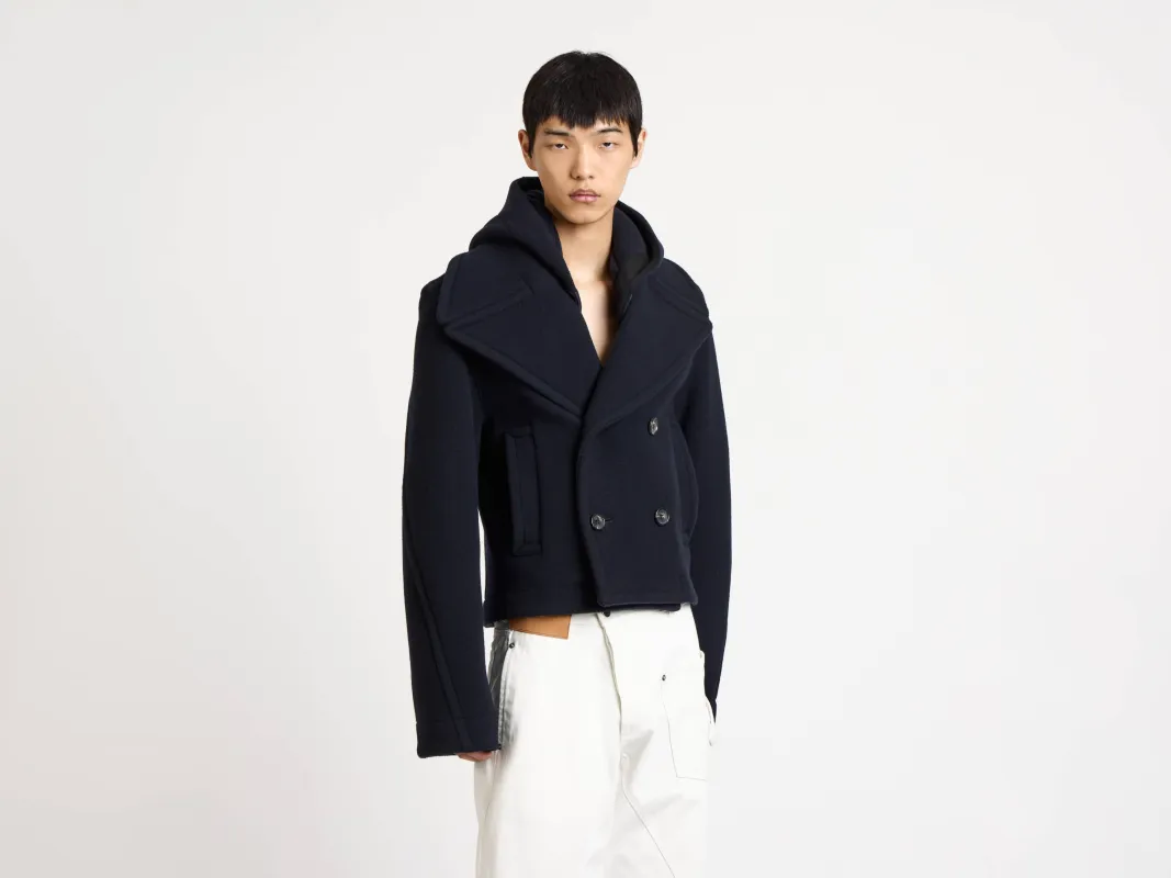 MENS CROPPED HOODED COAT IN NAVY sold by J.W. Anderson