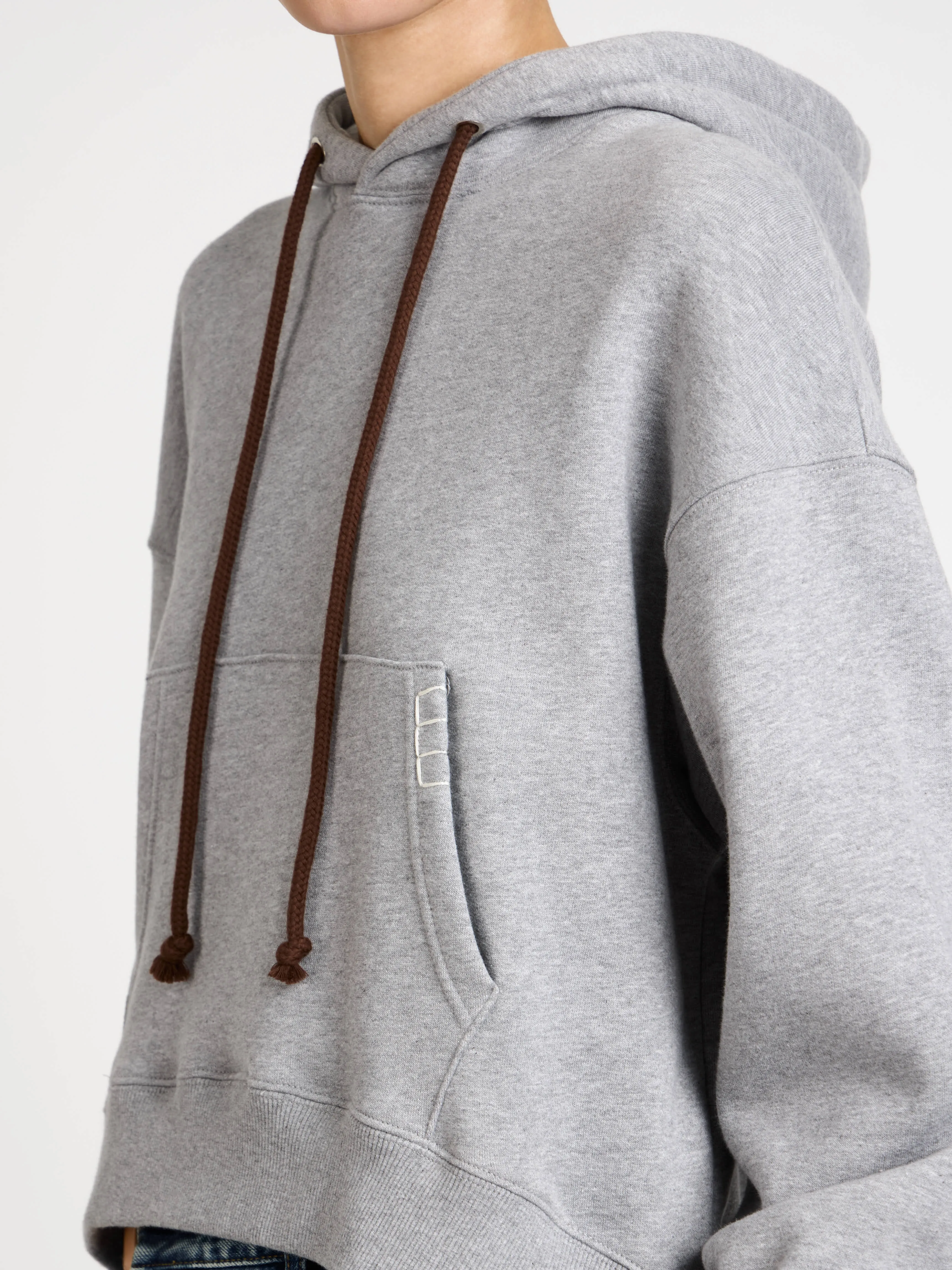 WOMENS CURVED HEM HOODIE IN MID GREY MELANGE sold by J.W. Anderson product image thumbnail 4