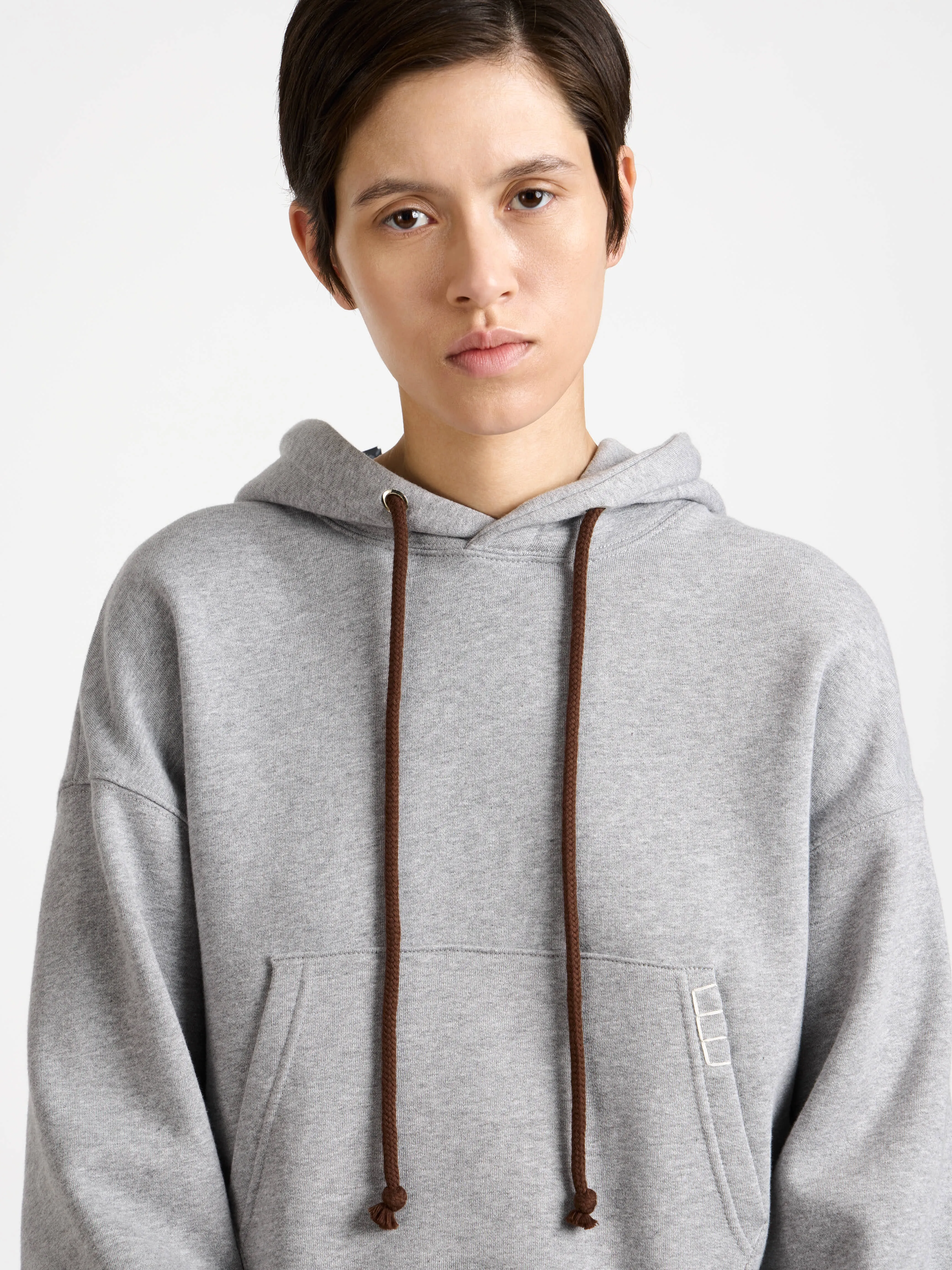 WOMENS CURVED HEM HOODIE IN MID GREY MELANGE sold by J.W. Anderson product image thumbnail 5
