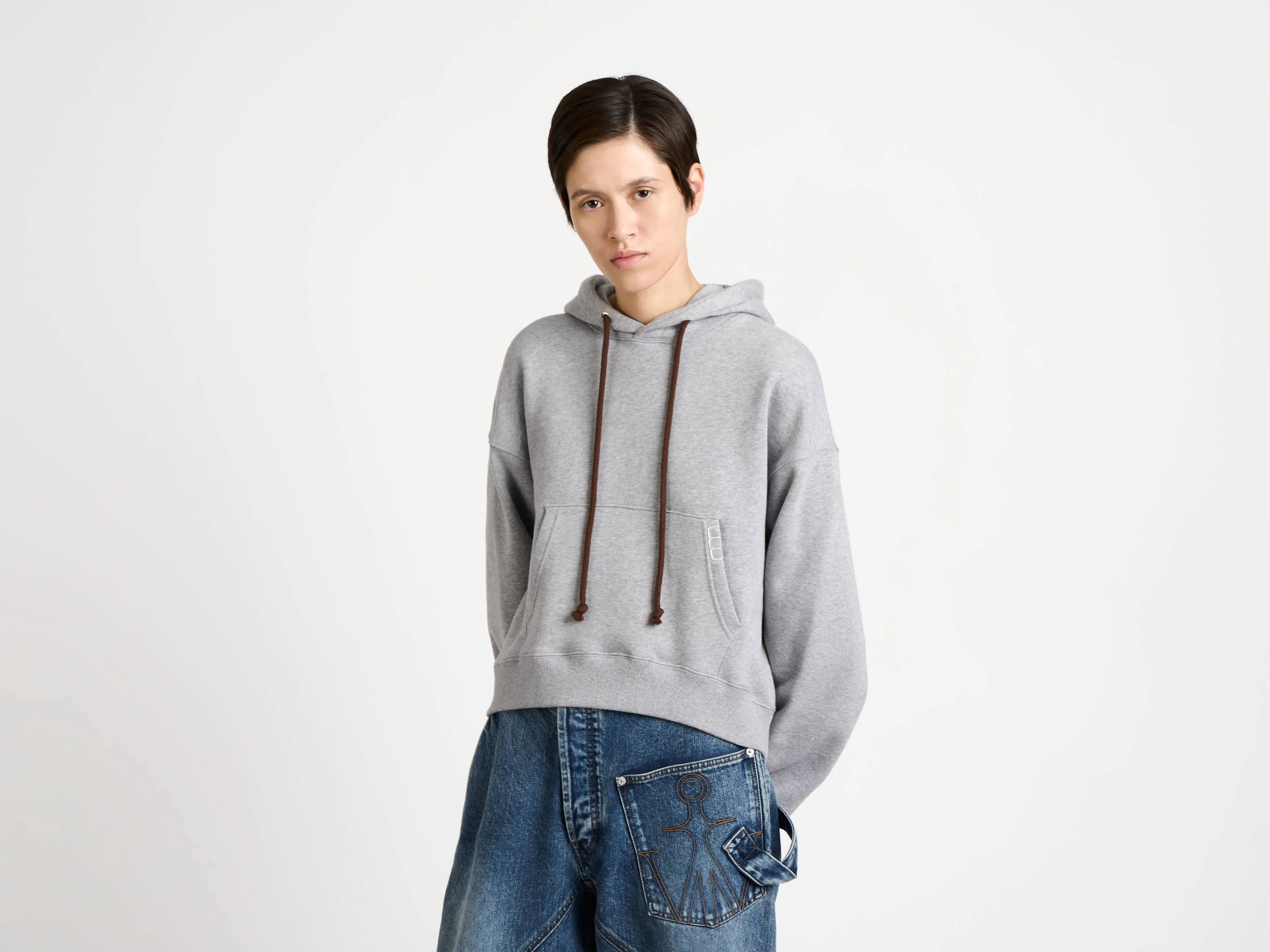 CL_CURVED HEM HOODIE - DARK BROWN MELANGE_JW0234PG1902 sold by J.W. Anderson