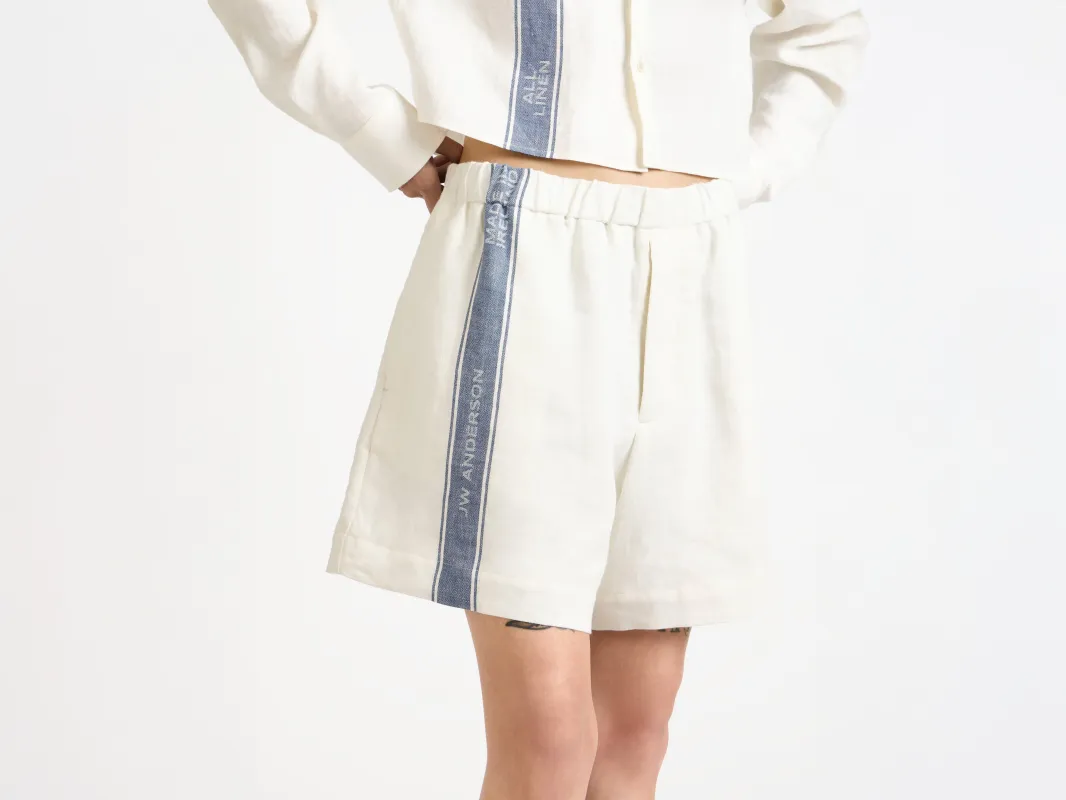 WOMENS SHORTS IN OFF WHITE & BLUE sold by J.W. Anderson