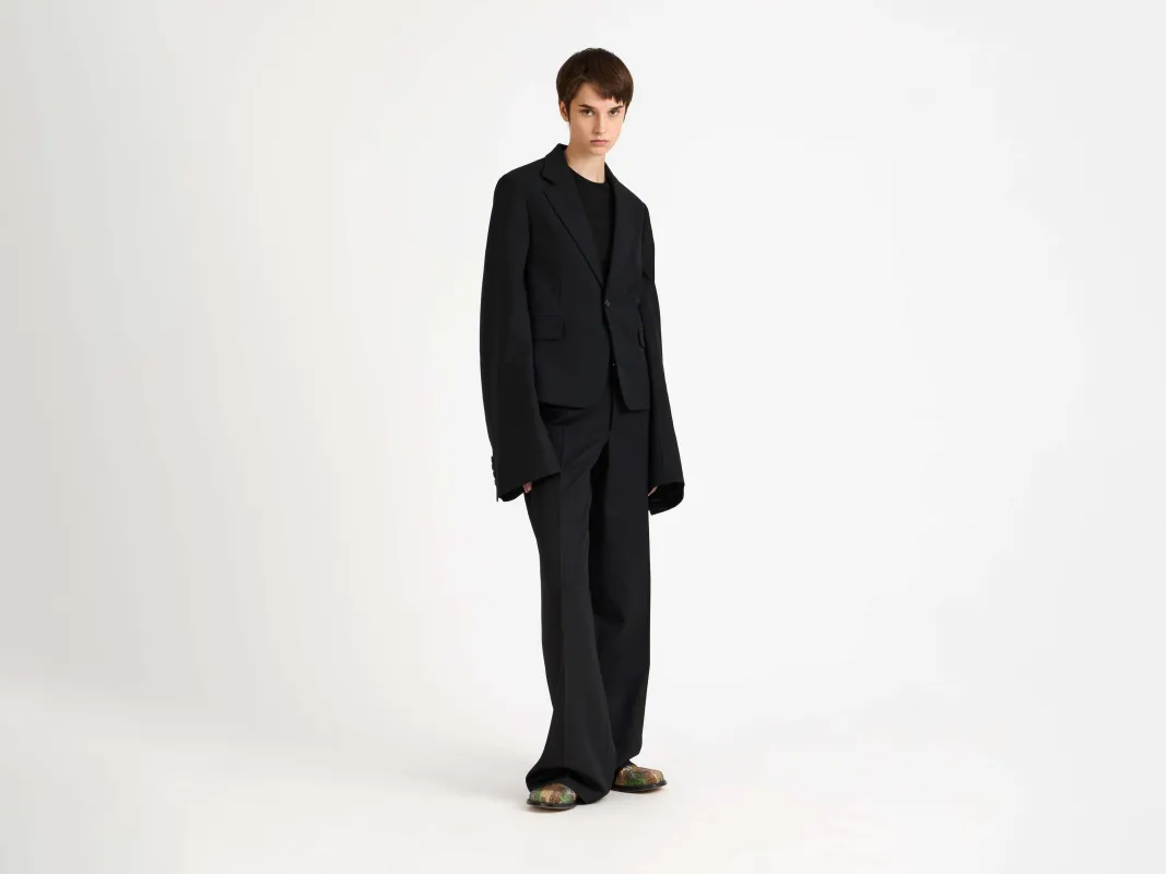 WOMENS BELL SLEEVE JACKET IN BLACK made by J.W. Anderson