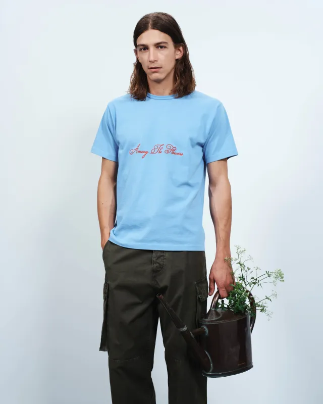 MENS AMONG THE FLOWERS T-SHIRT IN PALE BLUE made by J.W. Anderson