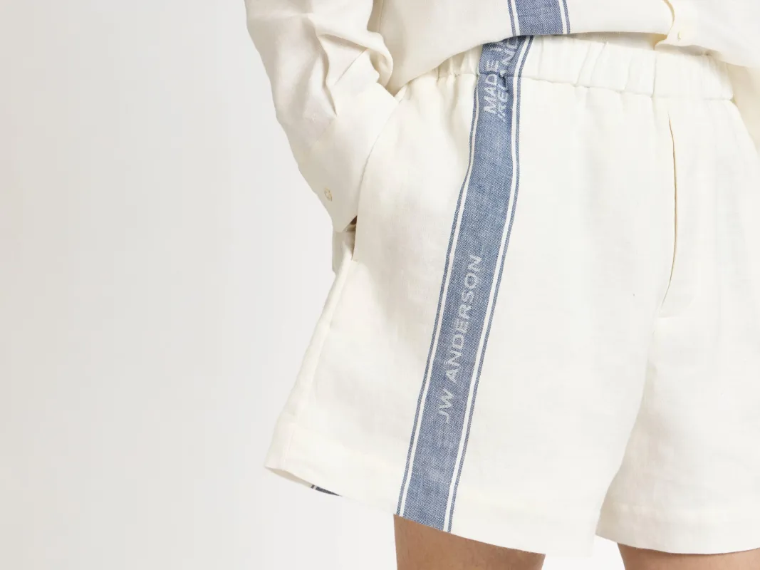 MENS SHORTS IN OFF WHITE & BLUE made by J.W. Anderson