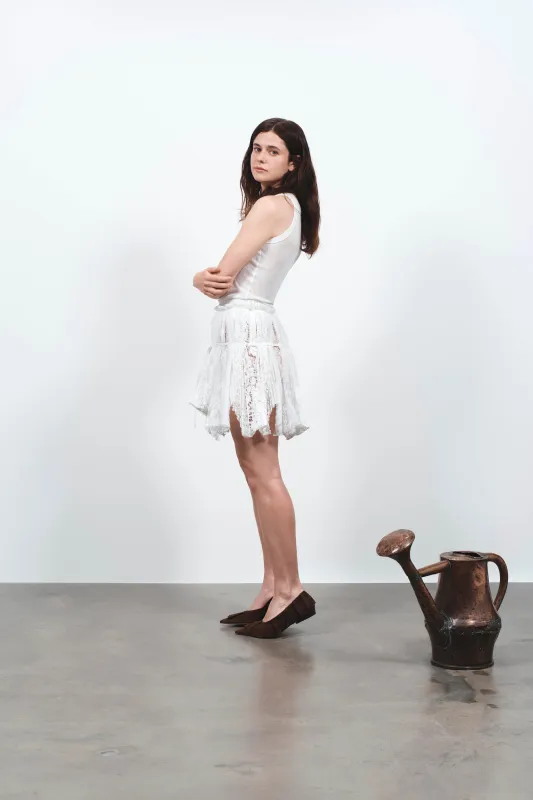 WOMENS MINI CURTAIN SKIRT IN WHITE made by J.W. Anderson