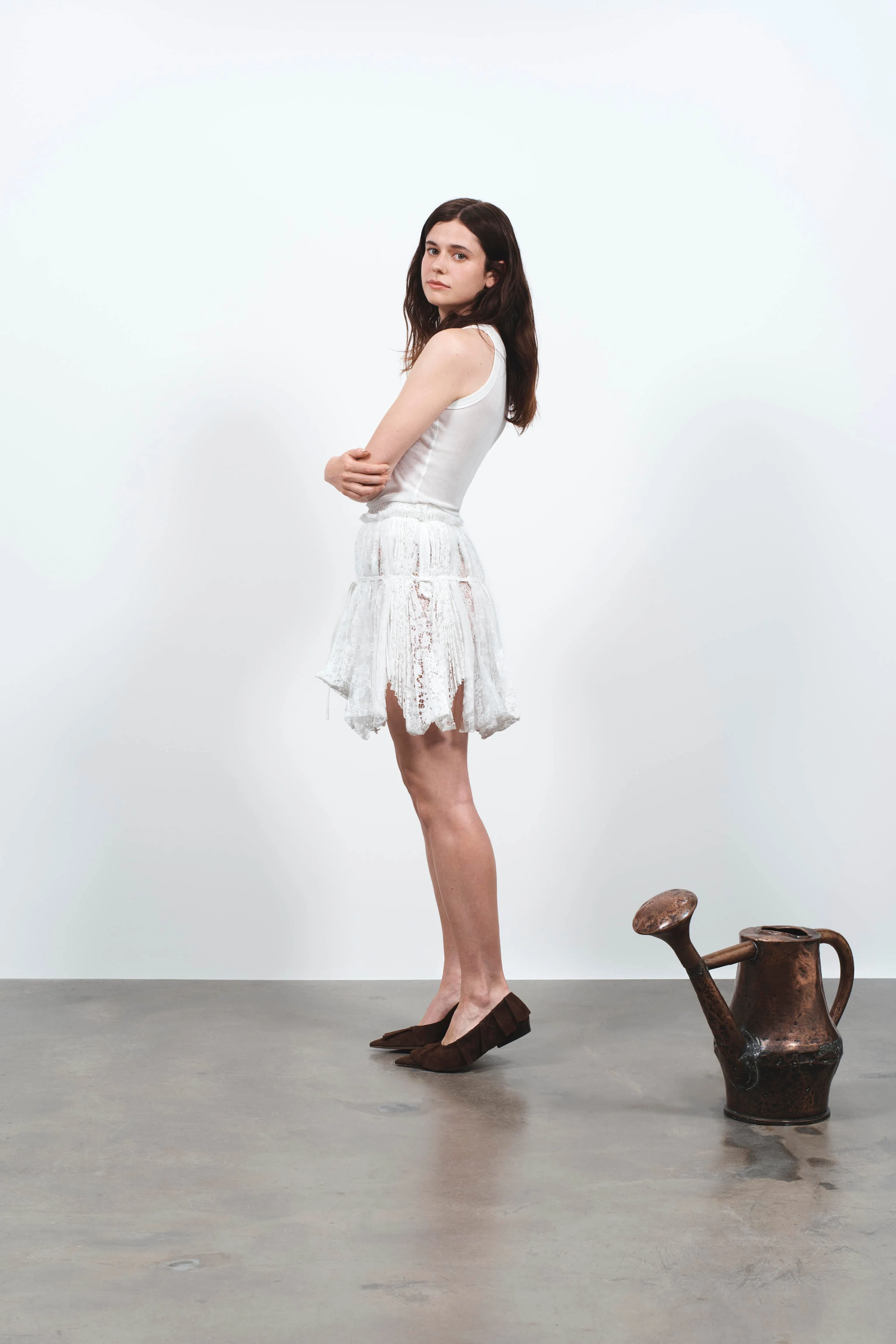 WOMENS MINI CURTAIN SKIRT IN WHITE sold by J.W. Anderson