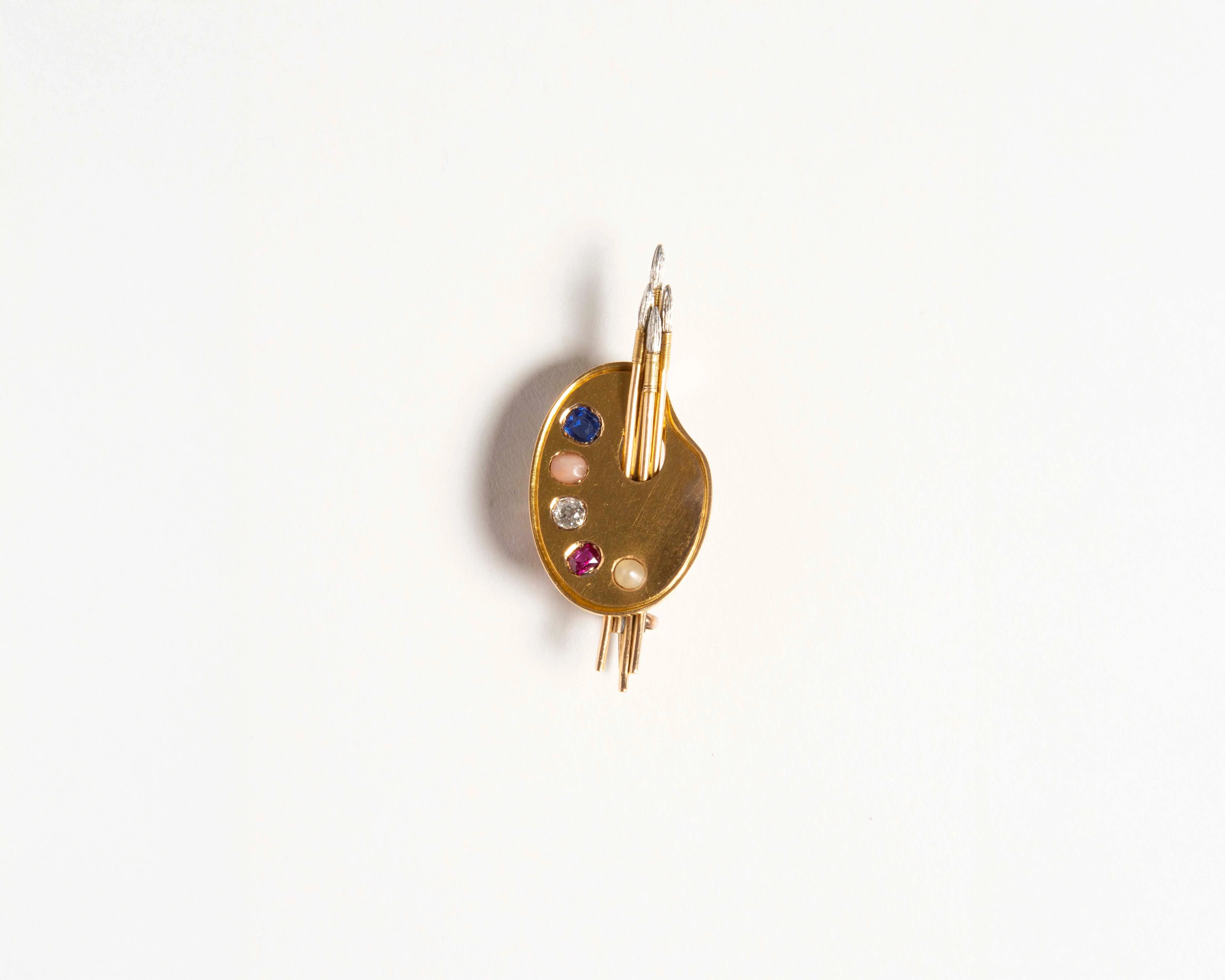 ARTIST'S PALETTE BROOCH IN 18KT GOLD sold by J.W. Anderson