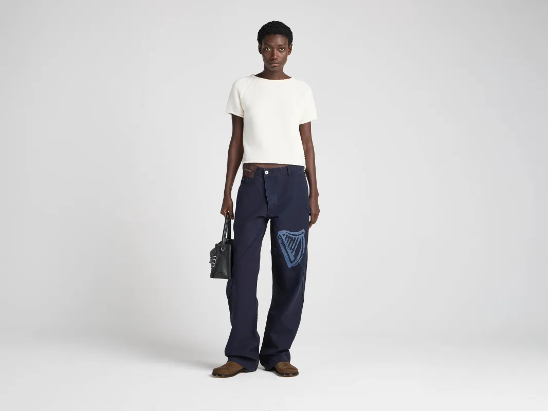 Unisex JW ANDERSON X GUINNESS WORKWEAR TROUSERS IN INDIGO made by J.W. Anderson