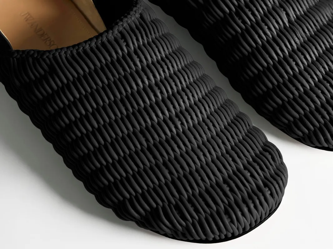 MENS SLIPPER MULES IN BLACK WOVEN LEATHER made by J.W. Anderson