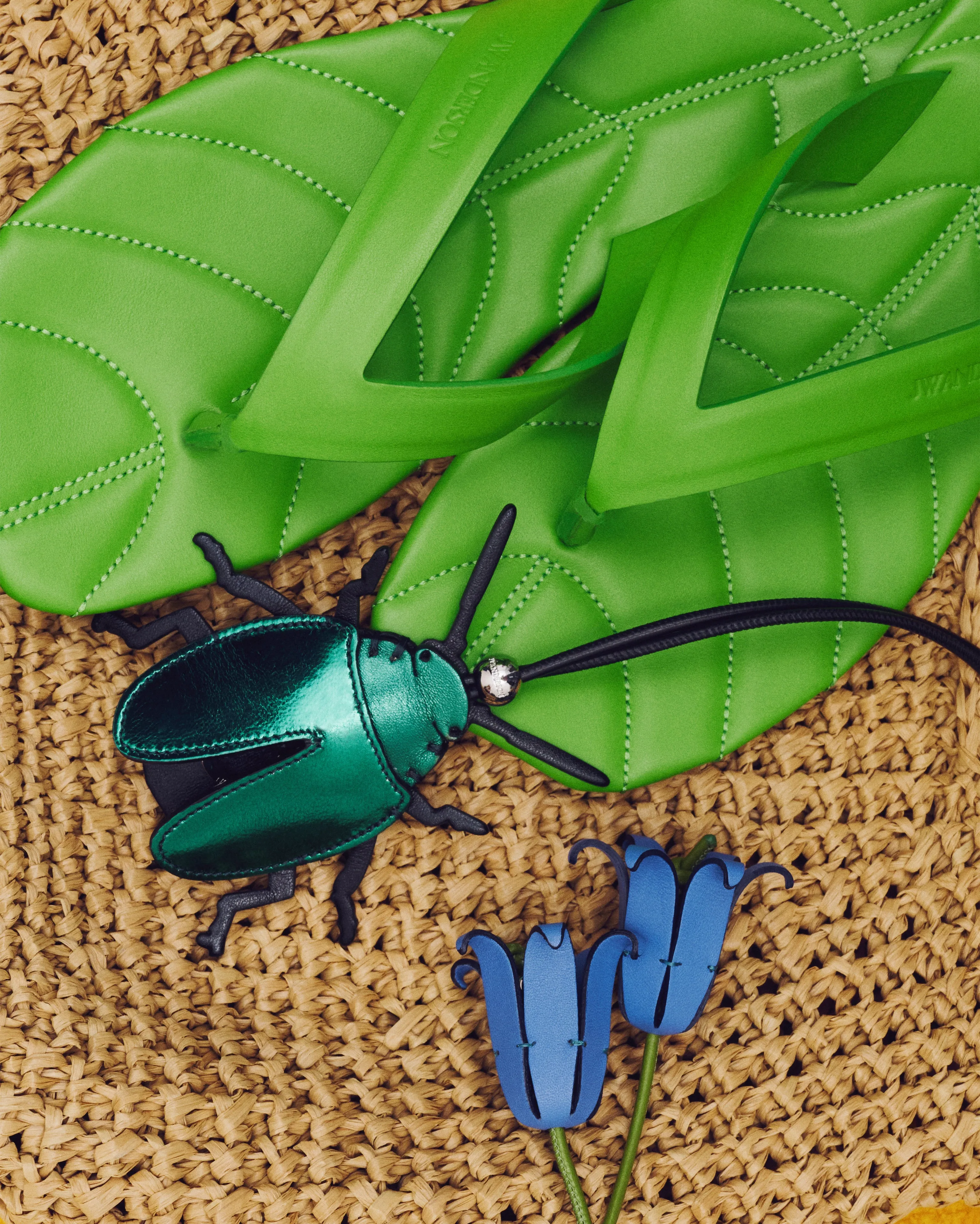 WOMENS LEATHER LEAF SLIDES IN LIME sold by J.W. Anderson