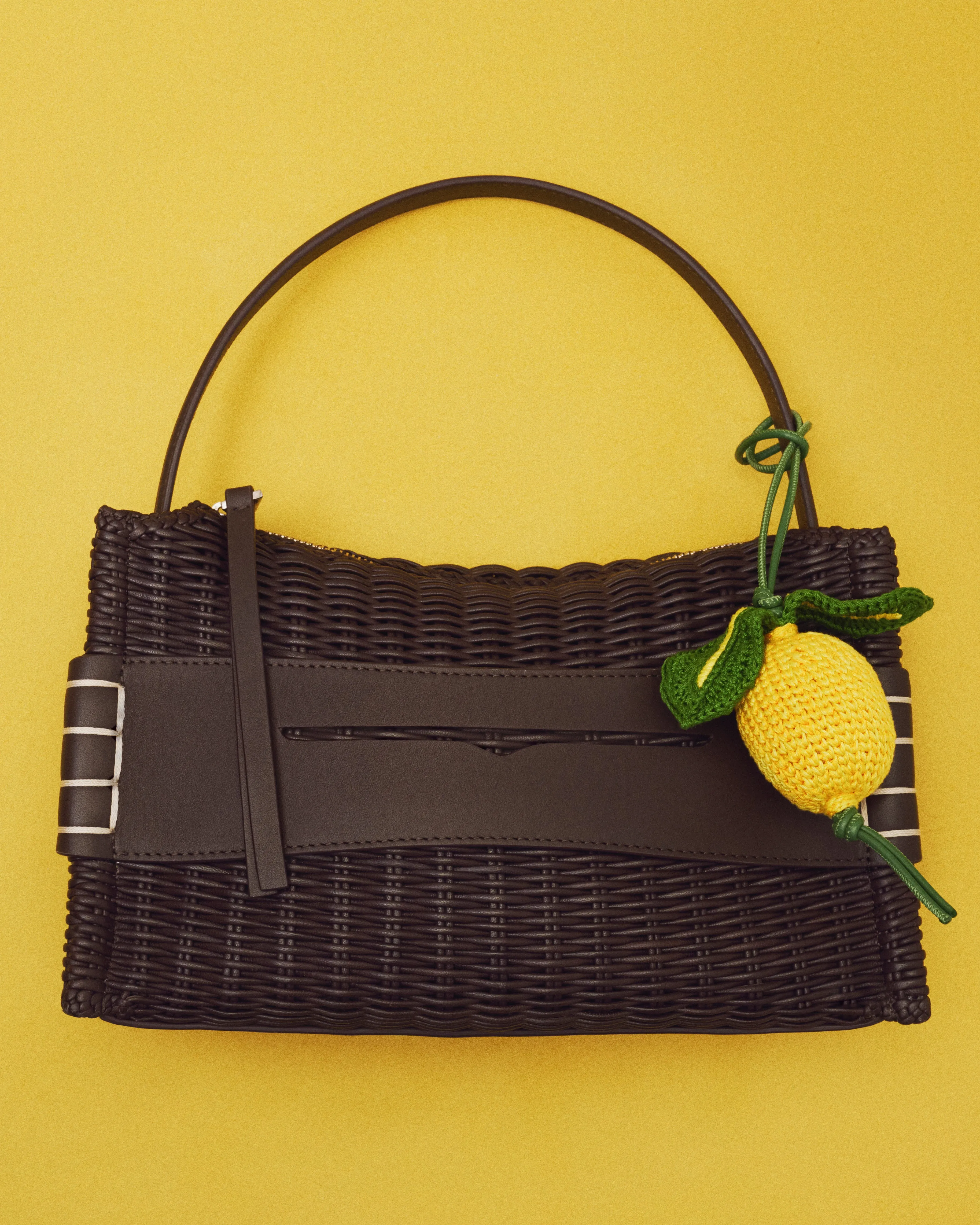 LOAFER BAG IN CHOCOLATE BROWN WOVEN LEATHER sold by J.W. Anderson