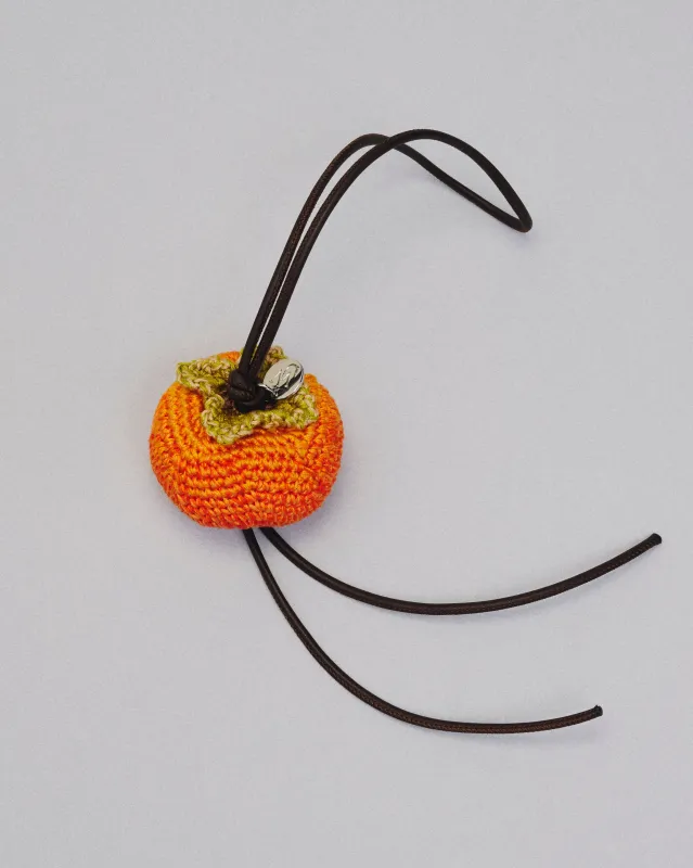 HAND-CROCHETED PERSIMMON CHARM made by J.W. Anderson
