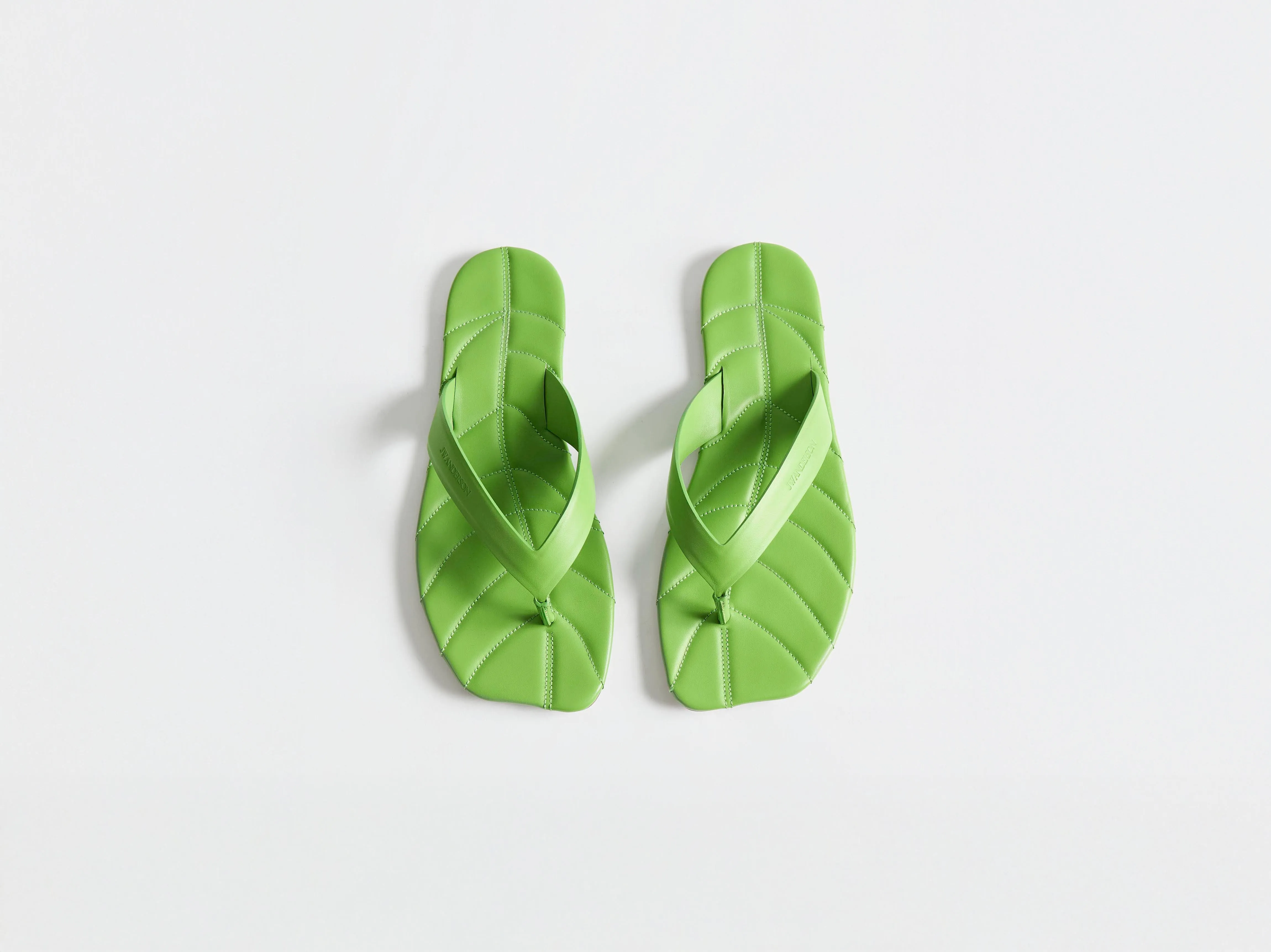 MENS LEATHER LEAF SLIDES IN LIME sold by J.W. Anderson