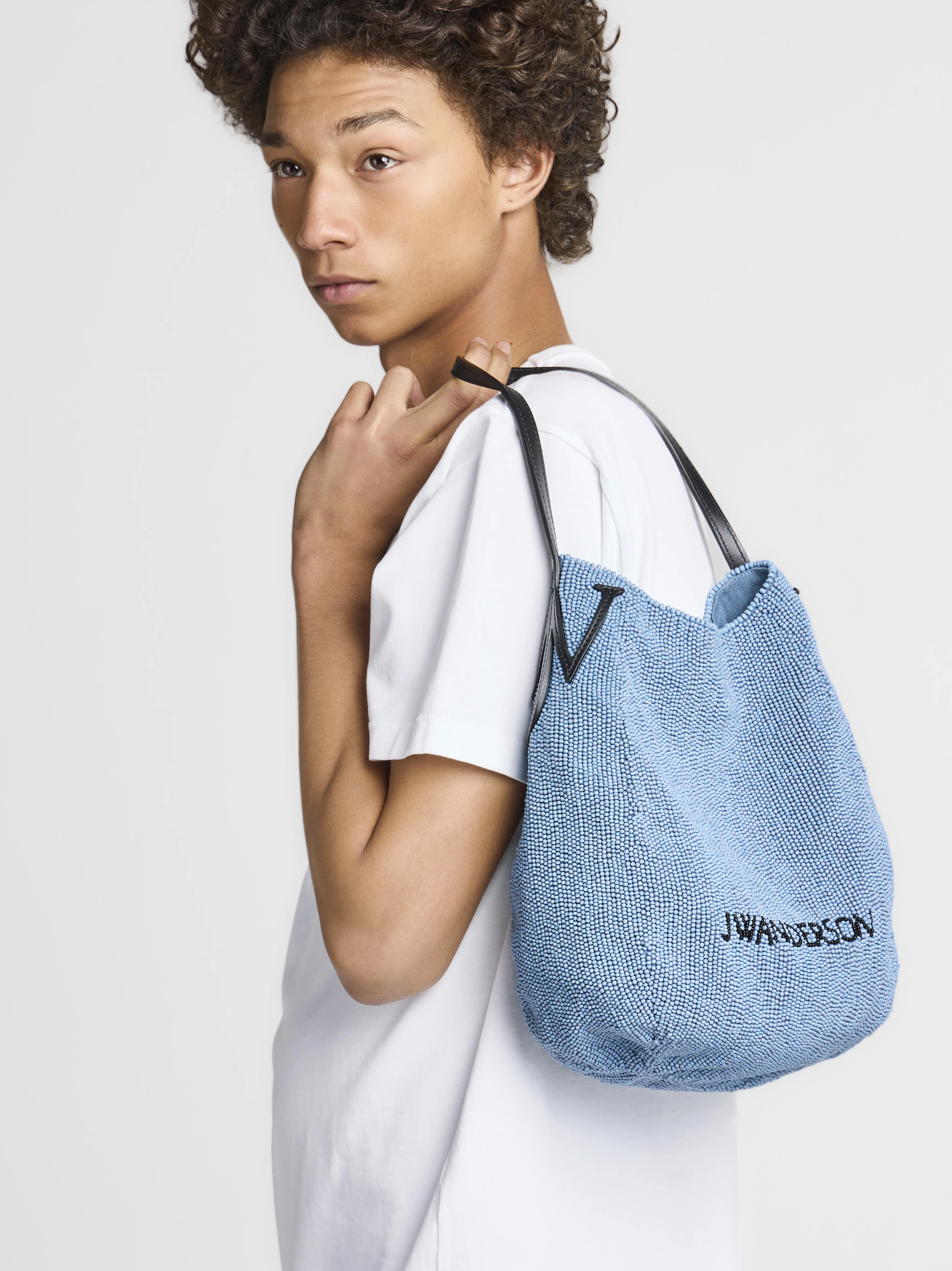 SMALL BEADED BULB BAG IN BLUE sold by J.W. Anderson