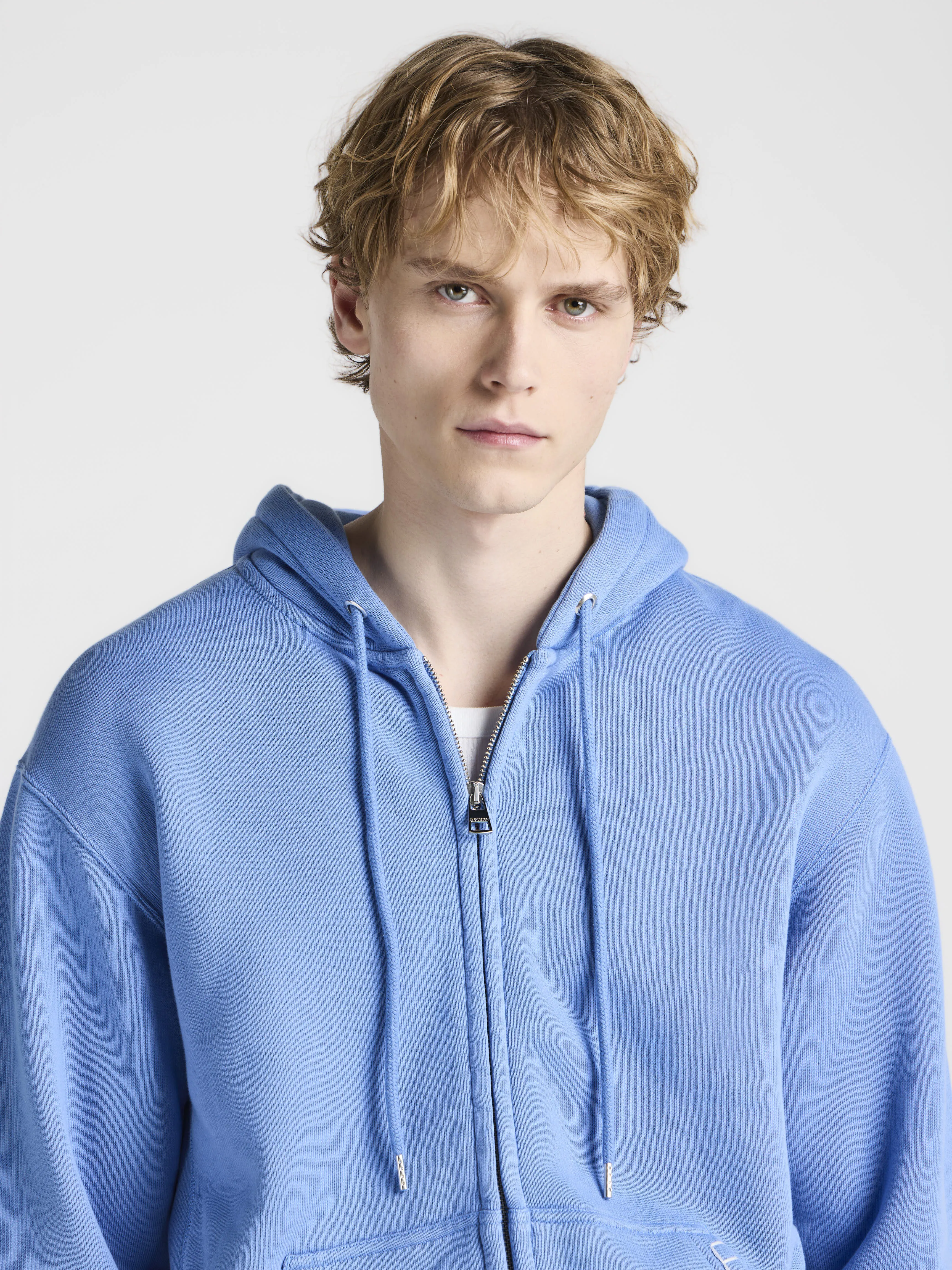 MENS FRONT ZIP HOODIE IN WASHED BLUE sold by J.W. Anderson