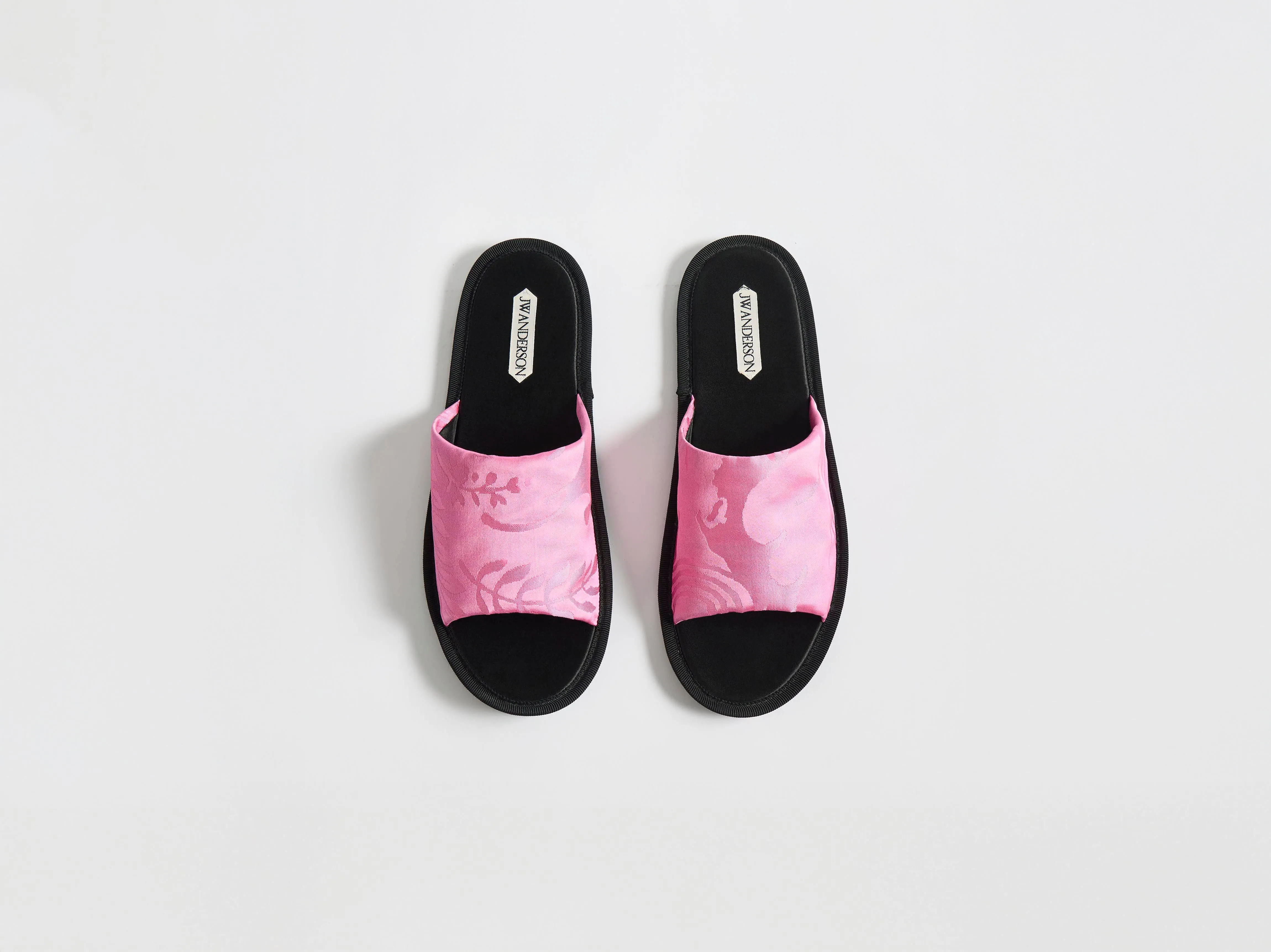 WOMENS OPEN TOE SLIDES IN CAMELLIA sold by J.W. Anderson