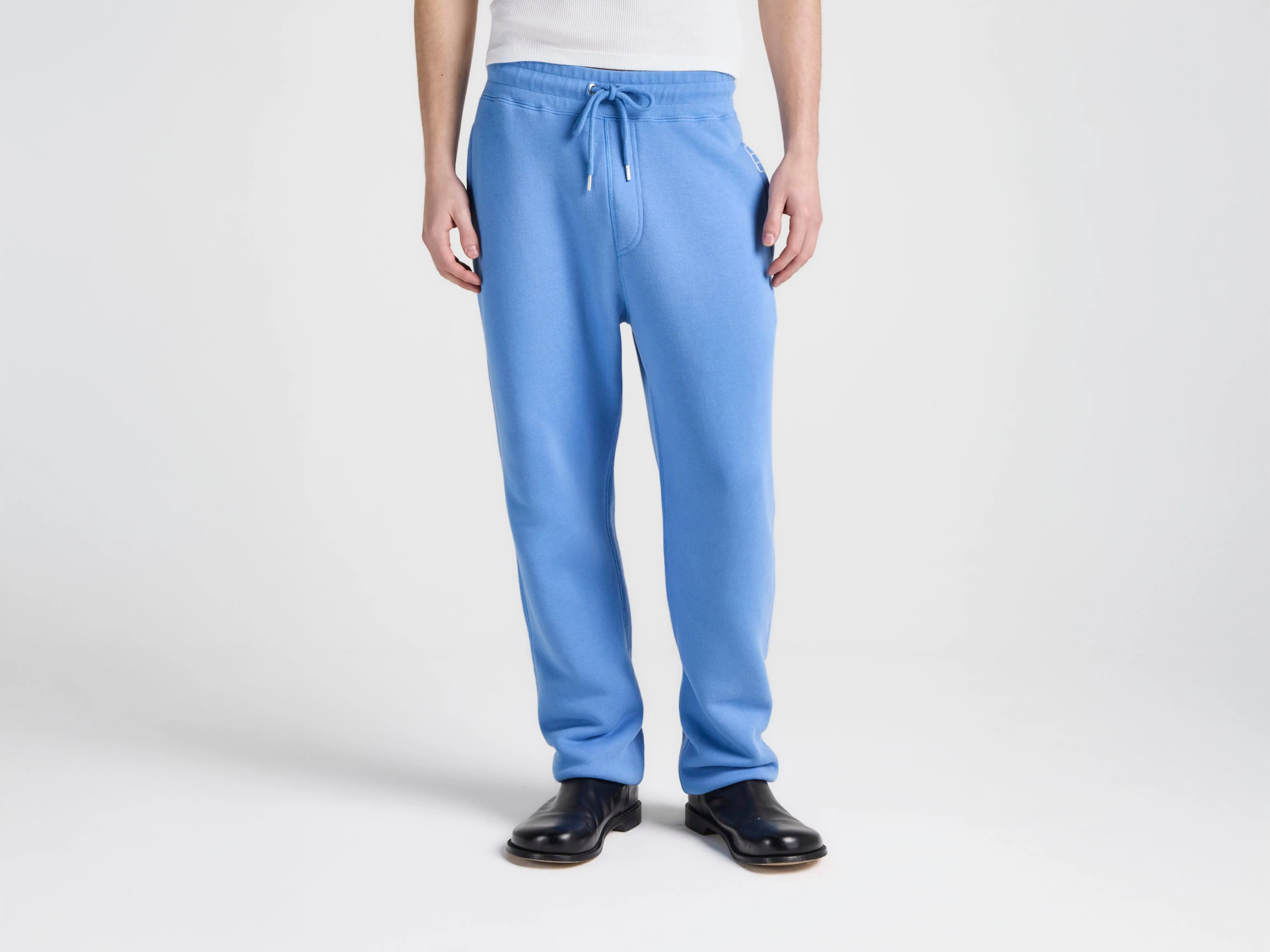 MENS CUFFED SWEATPANTS IN WASHED BLUE sold by J.W. Anderson