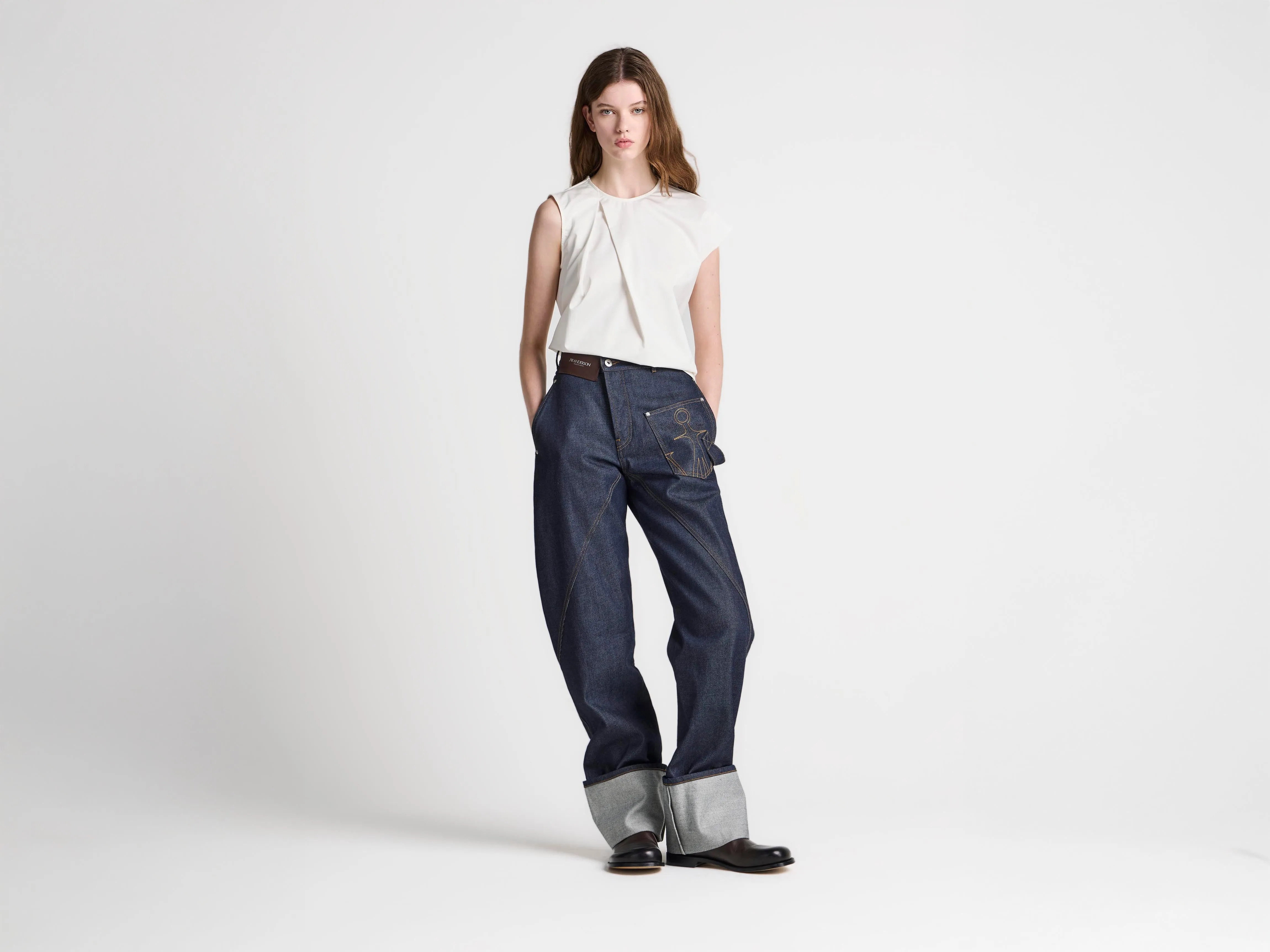WOMENS TWISTED TURN-UP WORKWEAR DENIM JEANS IN INDIGO sold by J.W. Anderson