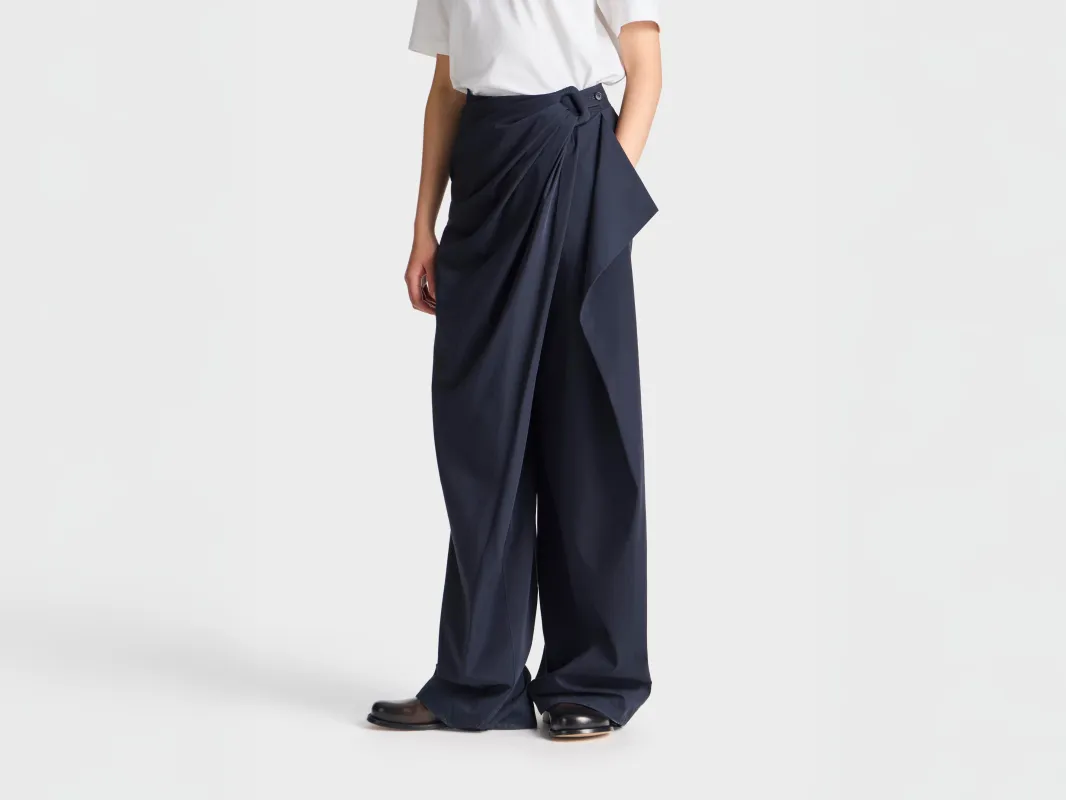WOMENS FOLD OVER TROUSERS IN NAVY made by J.W. Anderson