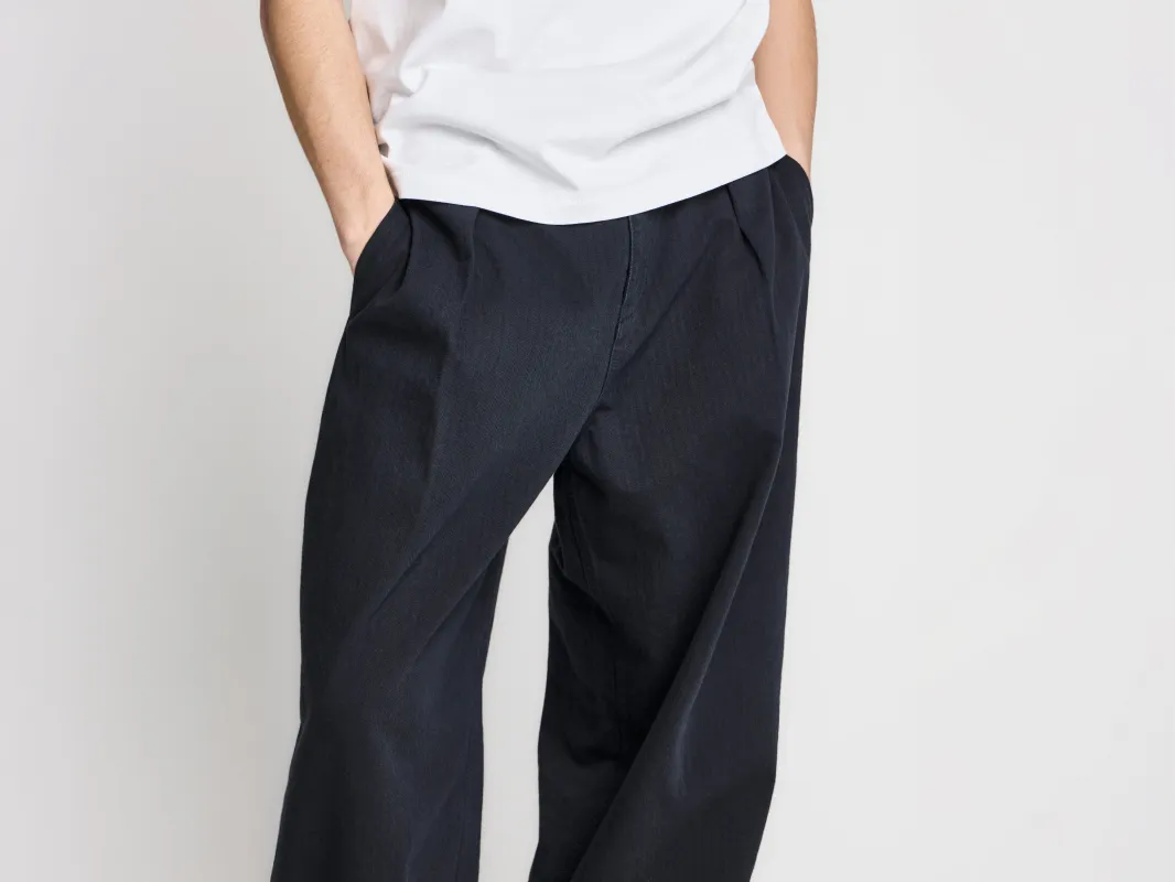 MENS SINGLE PLEAT TROUSERS IN BLACK made by J.W. Anderson