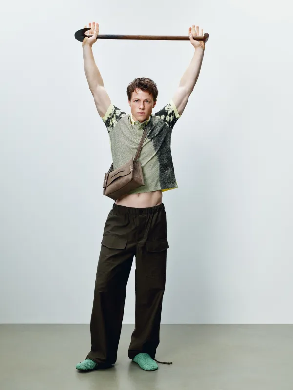MENS 'MAN WITH DAISIES' SHORT SLEEVED POLO IN PALE YELLOW made by J.W. Anderson