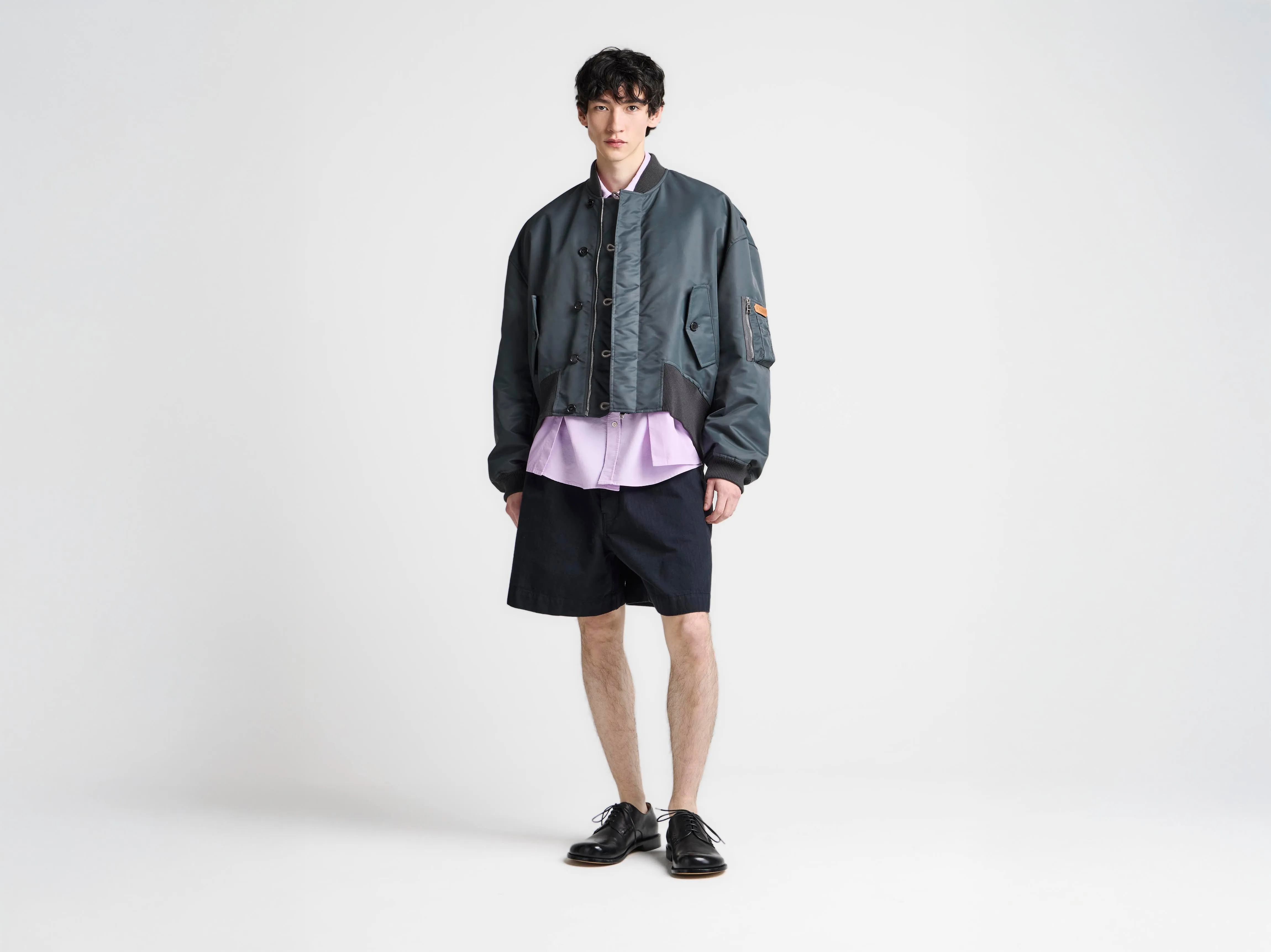 MENS OVERSIZED TIPPED HEM BOMBER JACKET IN DARK GREY sold by J.W. Anderson